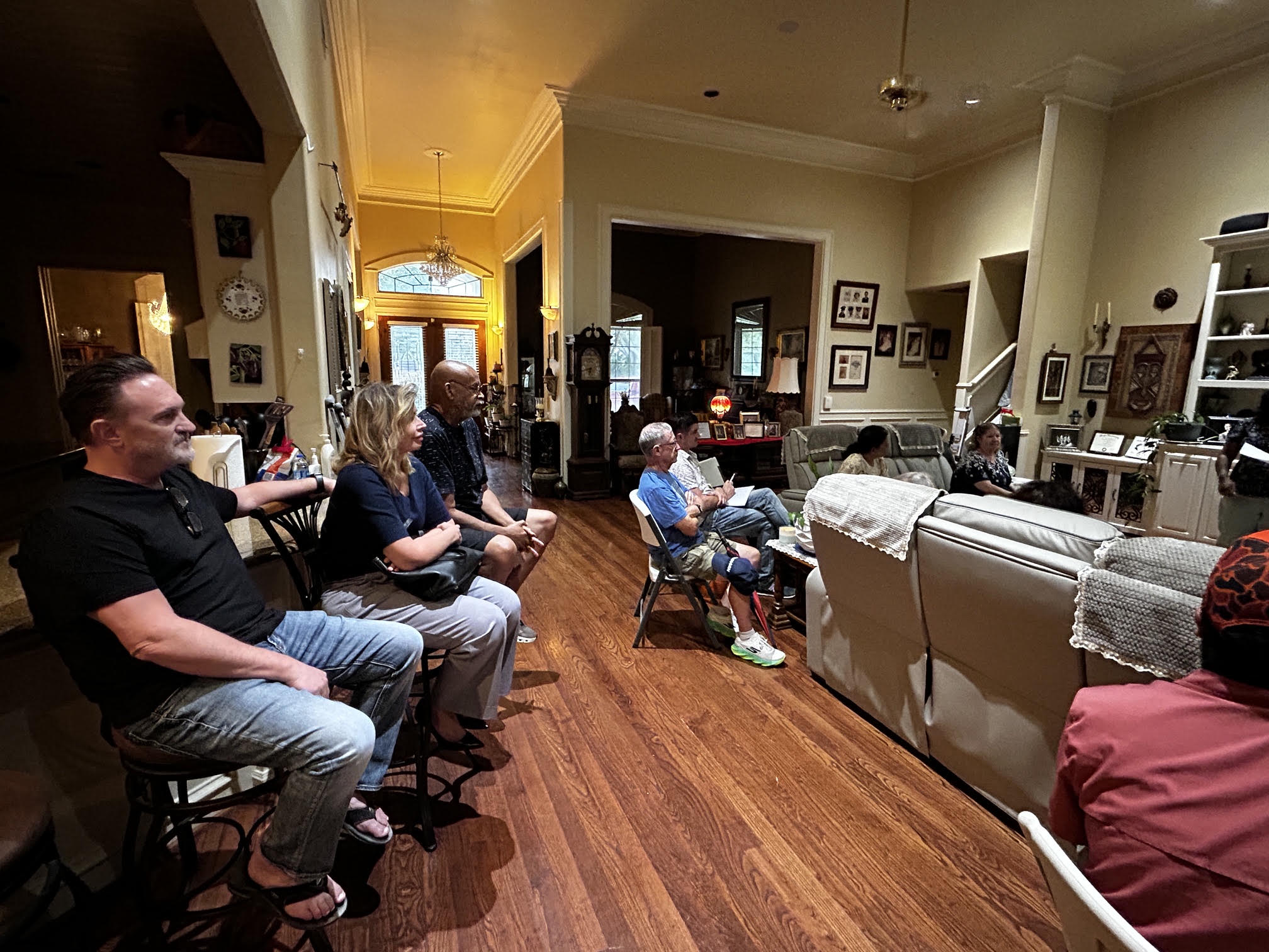 Neighbors listening during the community meeting