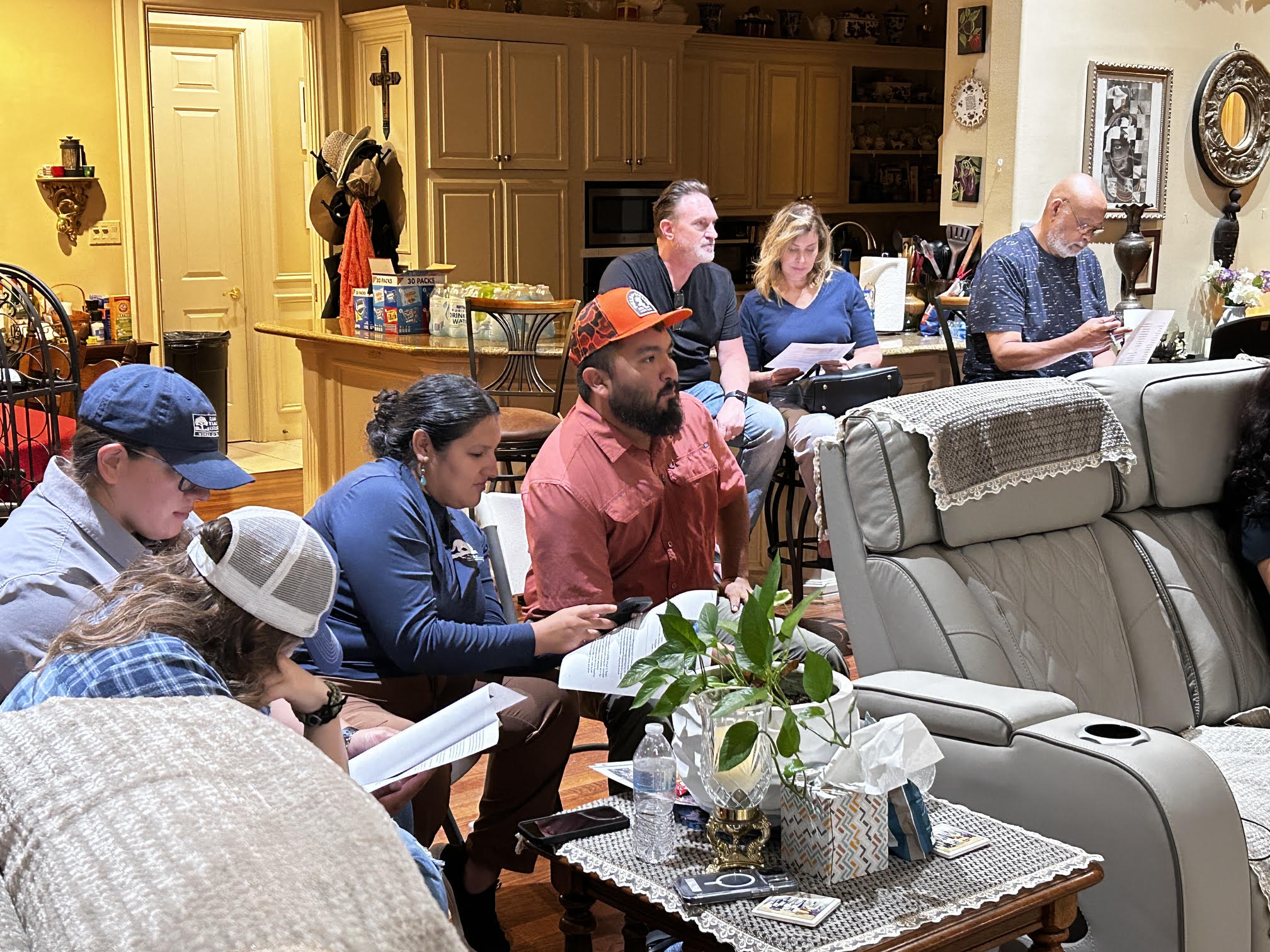 Community members reviewing meeting materials together