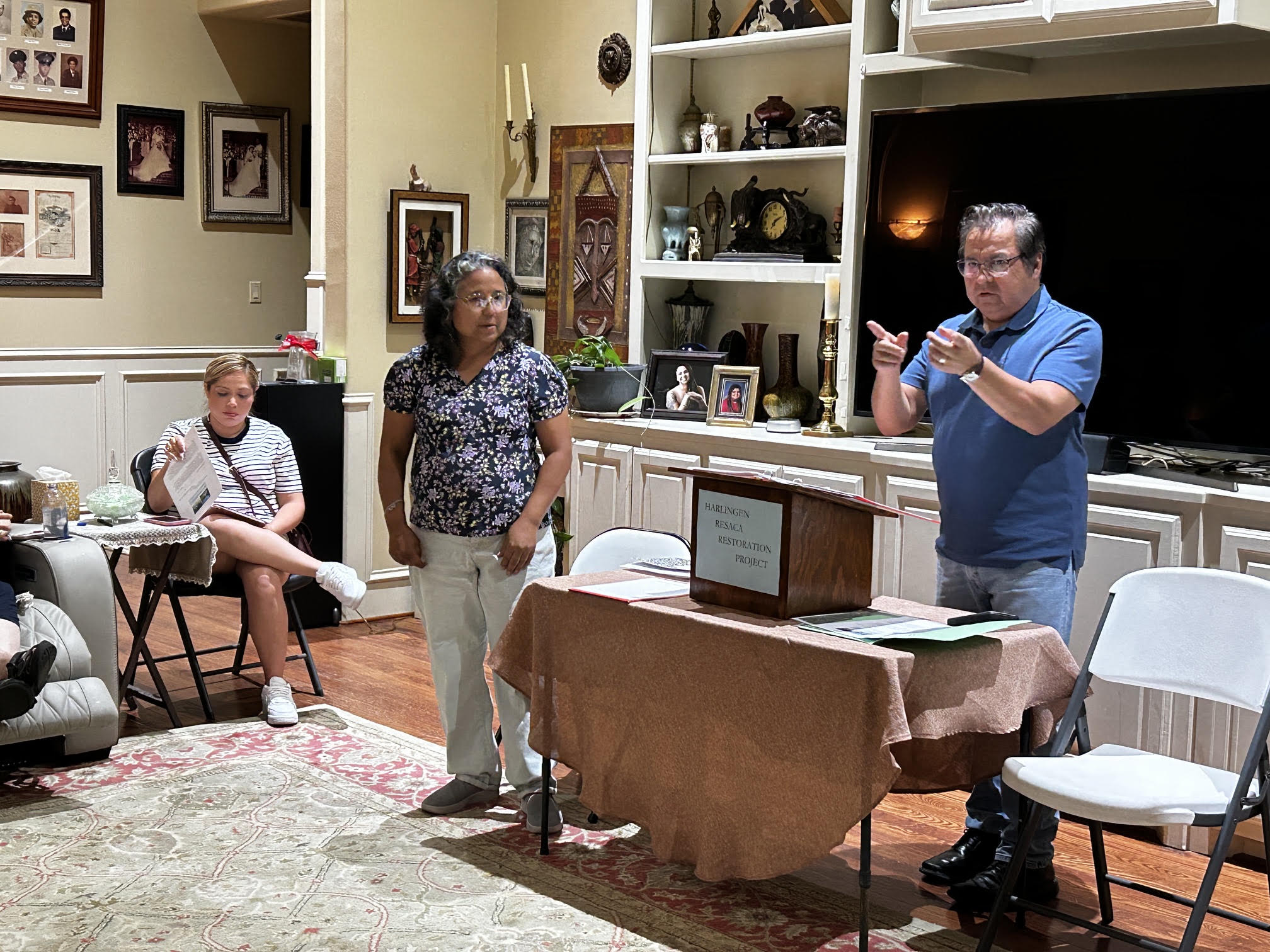 Community leaders presenting at a resaca restoration meeting